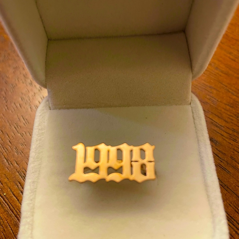In silver 1998  stainless steel resizable ring